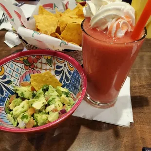 Authentic Mexican guac and strawberry daiquiri, always on point!