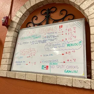 a menu on a white board