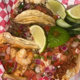 Shrimp, pastor, two steak tacos