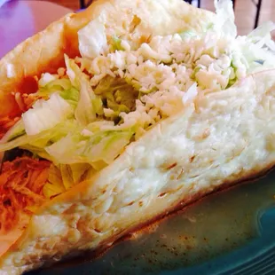 Chicken taco salad... In a puddle of oil and water.