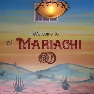 a sign for el mariachi