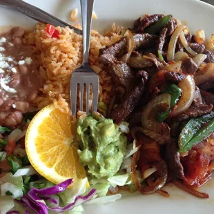 Carne Asada w/ a Korean marinade tossed in peppers and onions.