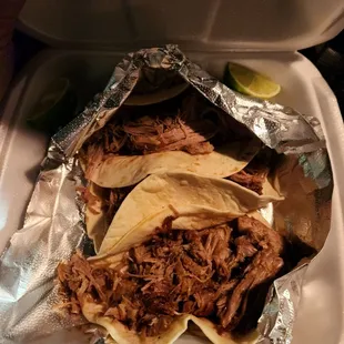 Carnitas street tacos, lots of delicious meat!