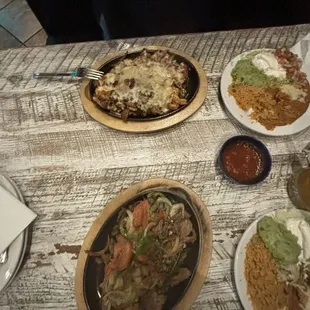 Steak fajita, small $19.99 p/t &amp; spicy 4 meat fajita $21.99... not worth the $$