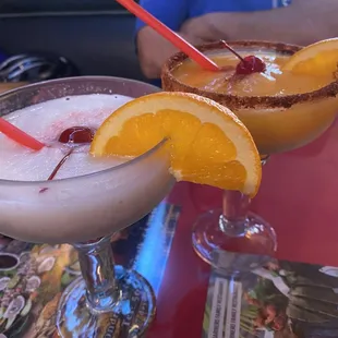 Piña colada and a mango margarita