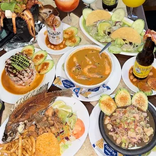 a table full of food and drinks