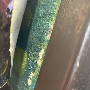 Behind the mural