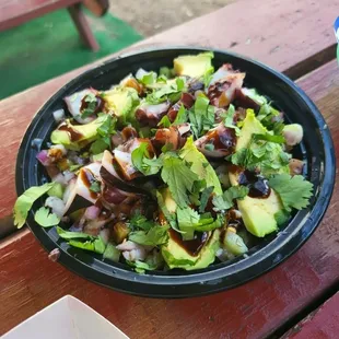 a plate of food on a picnic table