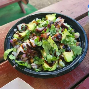 a plate of food on a picnic table
