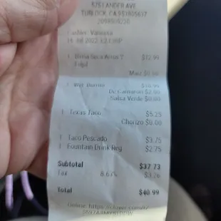 Ticket we were given to pay. No service charge here. No warning of one to come.