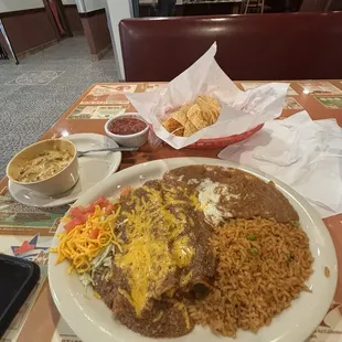 $21.95 Iced tea, cheese enchiladas w/refried beans &amp; rice; and chorizo queso, salsa, and chips.