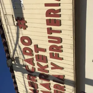 a sign on the side of a building