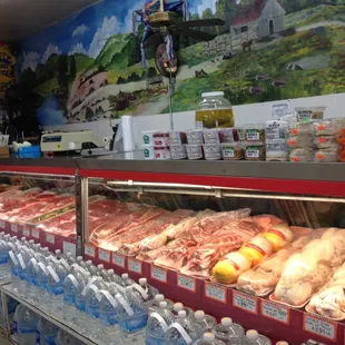a deli counter with a variety of food items