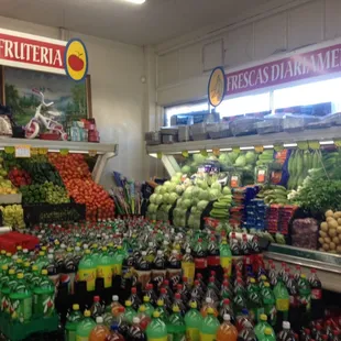 a grocery store filled with fruits and vegetables