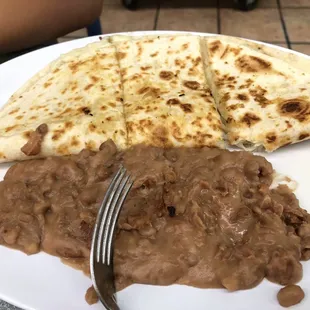 Kids quesadilla and beans ( they didn&apos;t have fries)