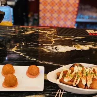 Croquetas and patatas bravas.