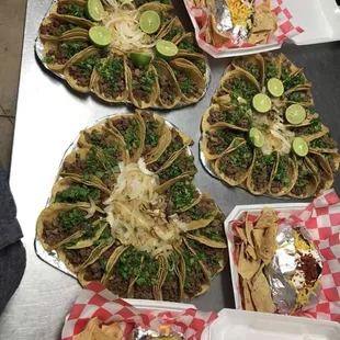 a table full of tacos