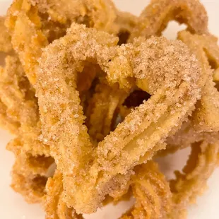 a pile of sugared onion rings