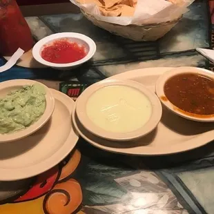 guacamole, queso, house hot sauce