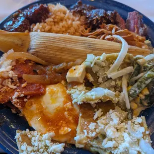 Brunch buffet was outstanding! Chilaquiles red and green, huevos en salsa, tamales, fajita, rice, beans, mole. You name it.