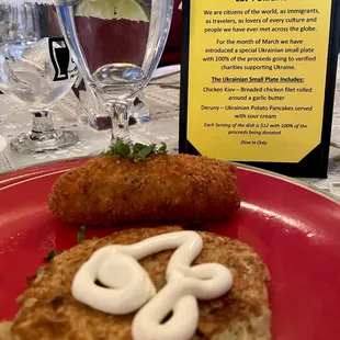 a plate of food and a glass of water