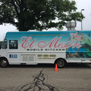 a food truck parked in a parking lot