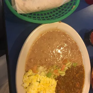 Green chile and beans with eggs. Yum!