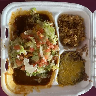 Red beef enchiladas rice and beans