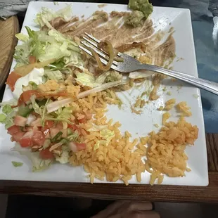 Food rice beans, and lettuce, tomatoes