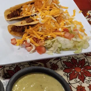 Two beef tacos a la carte.