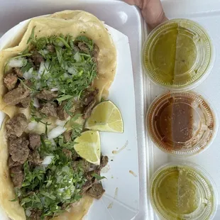 Sauce containers are almost as big as the tiny taco!