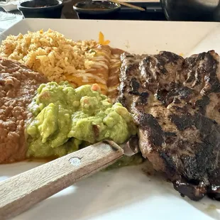 #4 El Tampiqueño, which comes with a cheese enchilada, steak, beans, and rice.