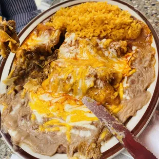 Shredded beef enchiladas plate