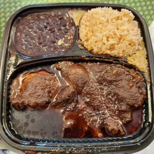 Mole Poblano - Chicken and Mexican sauce, with rice, beans and hand made tortillas.