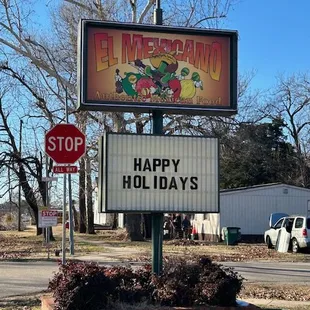 a happy holiday sign