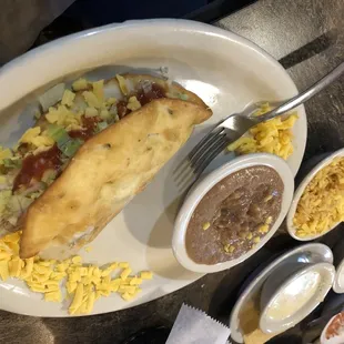 a plate of food and condiments