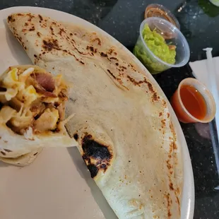 I went splitsies on the food with my friend. Bacon breakfast burrito !!