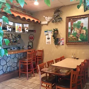 a table and chairs in a restaurant