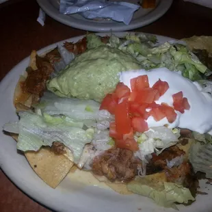 Half beef and chicken nachos.
