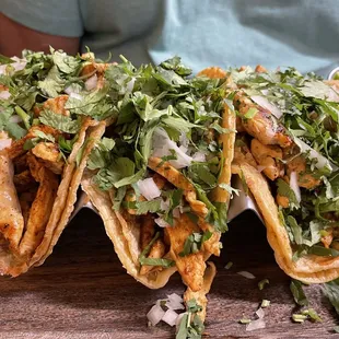 Chicken tacos with cilantro and onion!