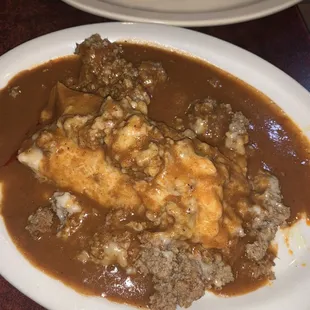 Pork tamale with beef sauce