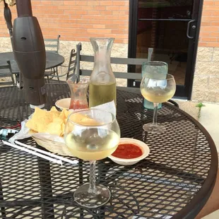 a table with drinks and snacks
