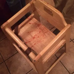 My daughters child seat after having dirty dishes dropped on it.