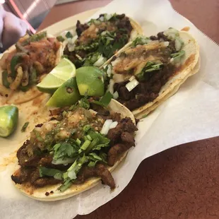 Fish taco and Al pastor tacos