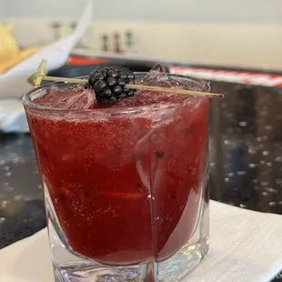 Blackberry, gin, lime.