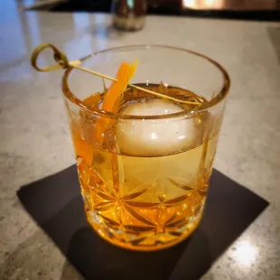 Bourbon and mole: smoke wagon bourbon, spice pear liquor, mas mole bitters, orange and lemon twist