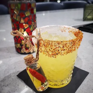 Heaven &amp; Hell margarita: tosco tequila reposado, hell fire habanero bitters, green chile vodka, lime &amp; lemon juice, passionfruit syrup