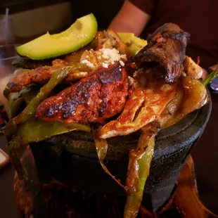 a plate of food on a grill