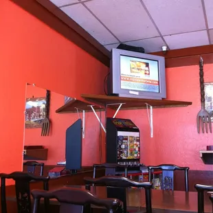 a restaurant with a flat screen tv