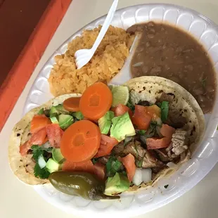 Carnitas, rice, and beans. However you like it, they make it your way!